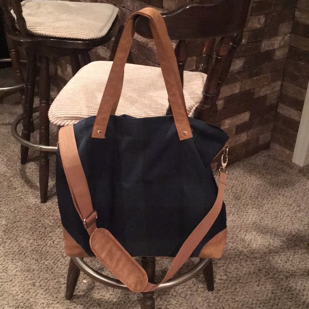 Large hunter green and navy tartan crossbody bag.